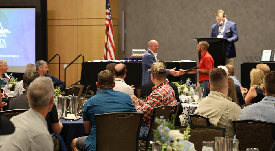 Champions of Delta Luncheon - Jeff Wardlaw shaking Chris Williams' hand